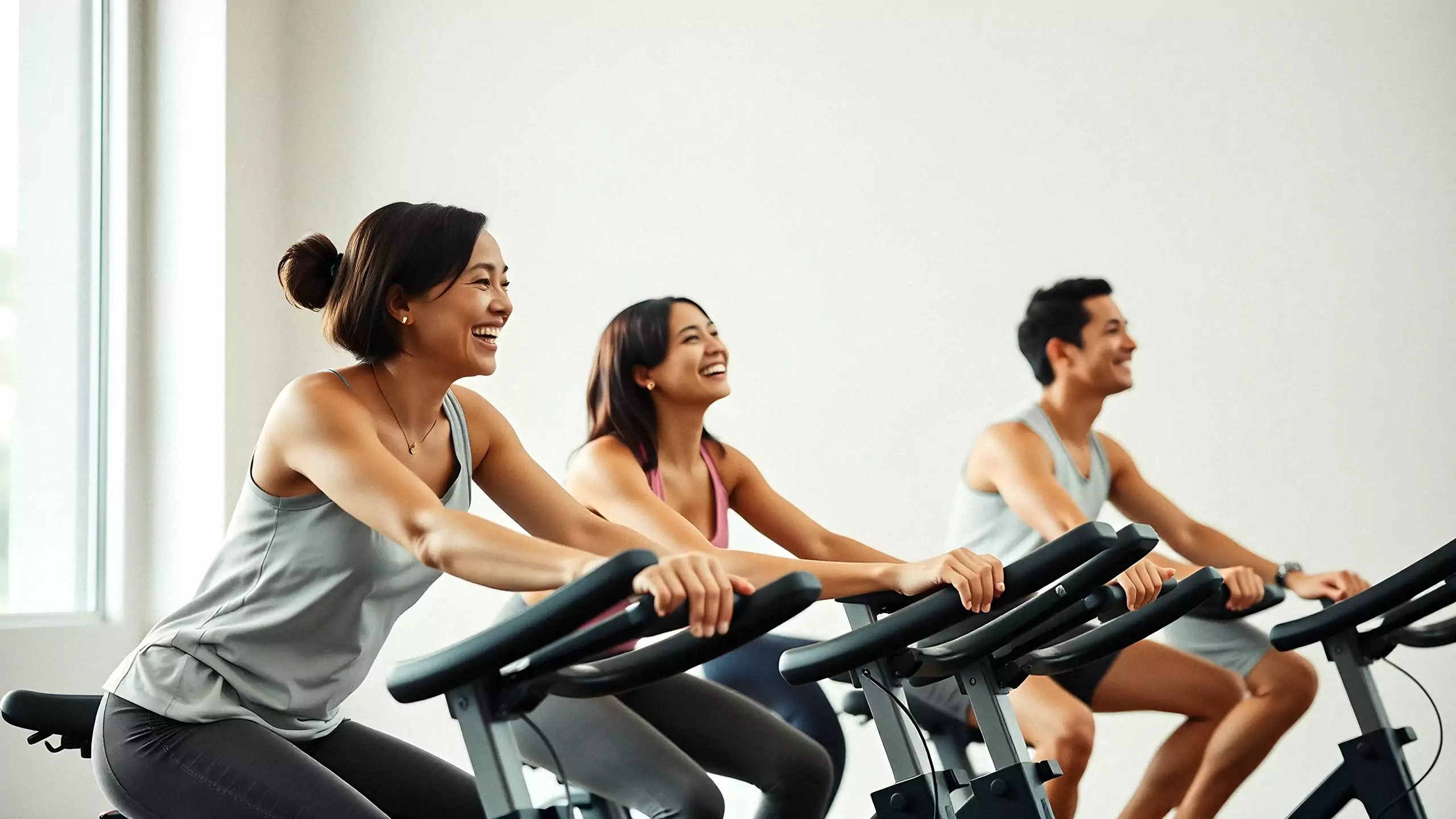 Office colleagues laughing through a team circuit class